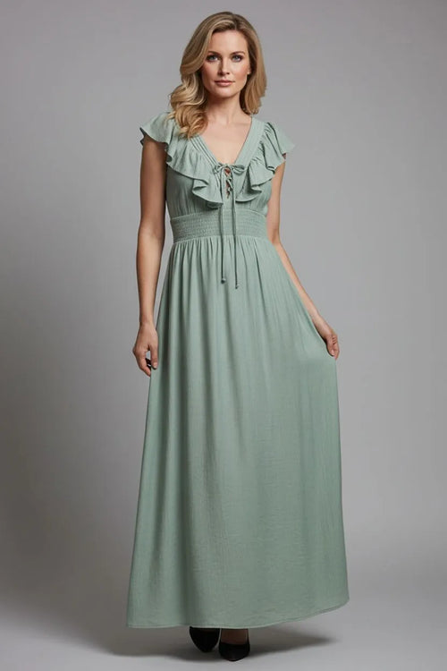 A soft sage green midi dress with flutter sleeves and a side slit featuring a lace-up v neck design