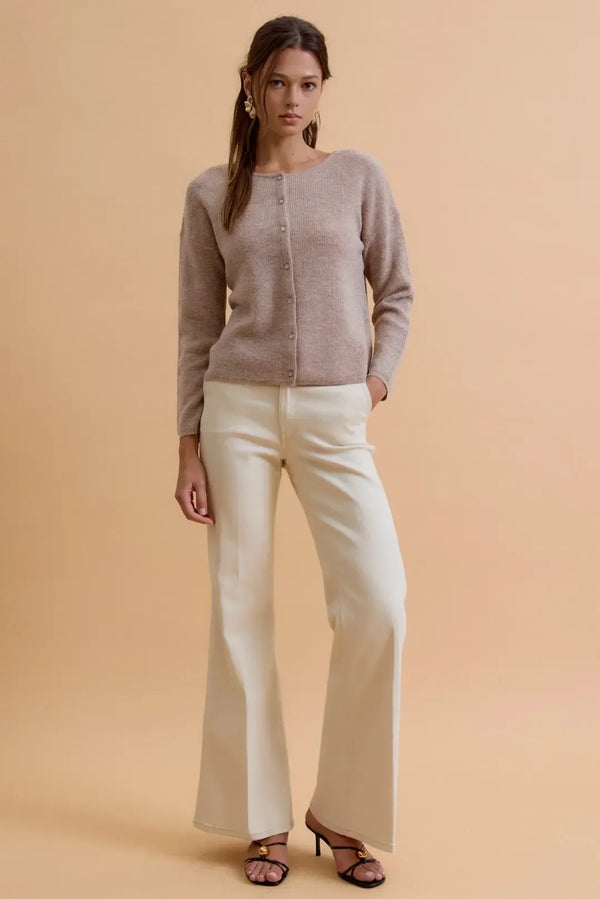 A soft taupe round neck wool ribbed cardigan with button-down front and subtle textured pattern