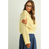 A soft yellow and white striped knit cardigan with collar and stripe button front for women’s boho chic clothing