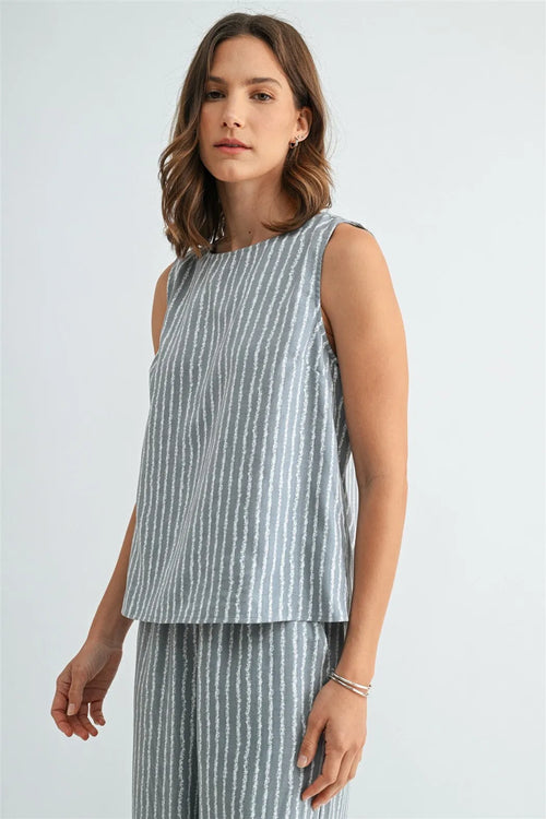Stripe with side details sleeveless top in soft gray with white vertical stripes made of lightweight fabric for women’s boho chic clothing from shop daisy