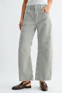 Striped wide leg denim jeans in black and white cotton with barrel silhouette and visible stitching details