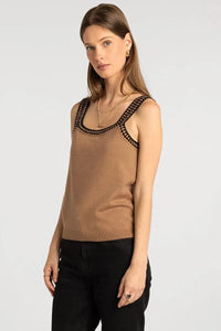 A tan knit sleeveless brittania tank with black crochet trim along the neckline and armholes by supply brittania
