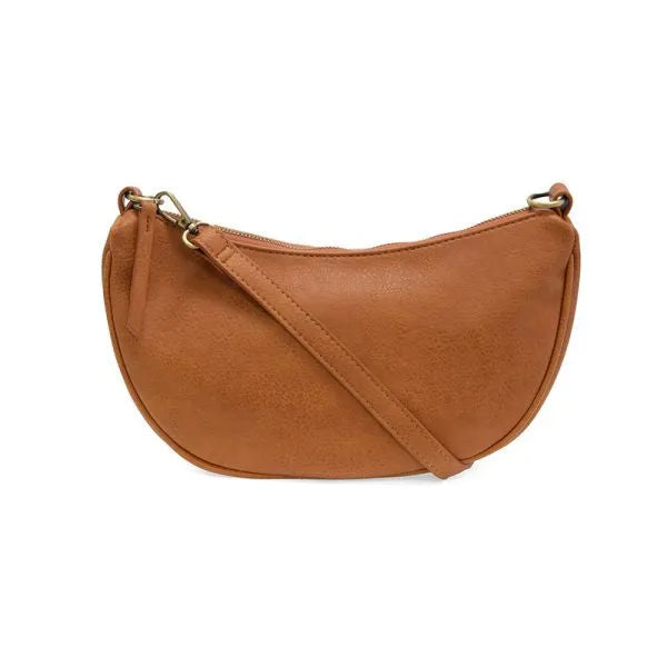 Tan leather miranda crescent crossbody bag with adjustable strap and gold-tone hardware for stylish convenience