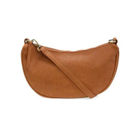 Tan leather miranda crescent crossbody bag with adjustable strap and gold-tone hardware for stylish convenience