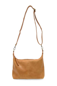 Tan leather danna top zip crossbody bag with single shoulder strap and zipper closure for women’s boho chic clothing