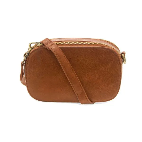 Tan leather layne double zip mini camera crossbody bag with gold tone zipper and hardware for everyday use