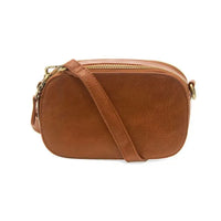 Tan leather layne double zip mini camera crossbody bag with gold tone zipper and hardware for everyday use