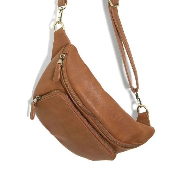 Tan leather rory organizer sling belt bag with gold-tone zippers and hardware for hands-free organization