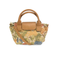 Tan leather handle and flap on abilene canvas mini floral patterned canvas mini tote crossbody with multicolor blossoms