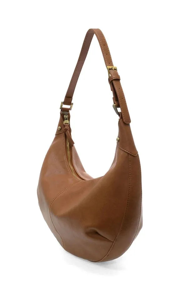 A tan leather leo crescent shoulder bag with a single strap and gold-tone hardware for everyday use