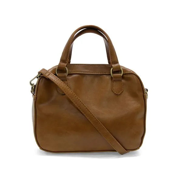 A tan leather regina mini satchel crossbody with two top handles and a detachable shoulder strap