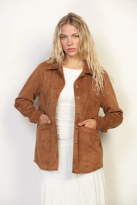 A tan suede classic western shacket with buttons, two front pockets, and a collar in western suede material