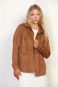 A tan suede classic western shacket with a classic collar and button closure for stylish layering