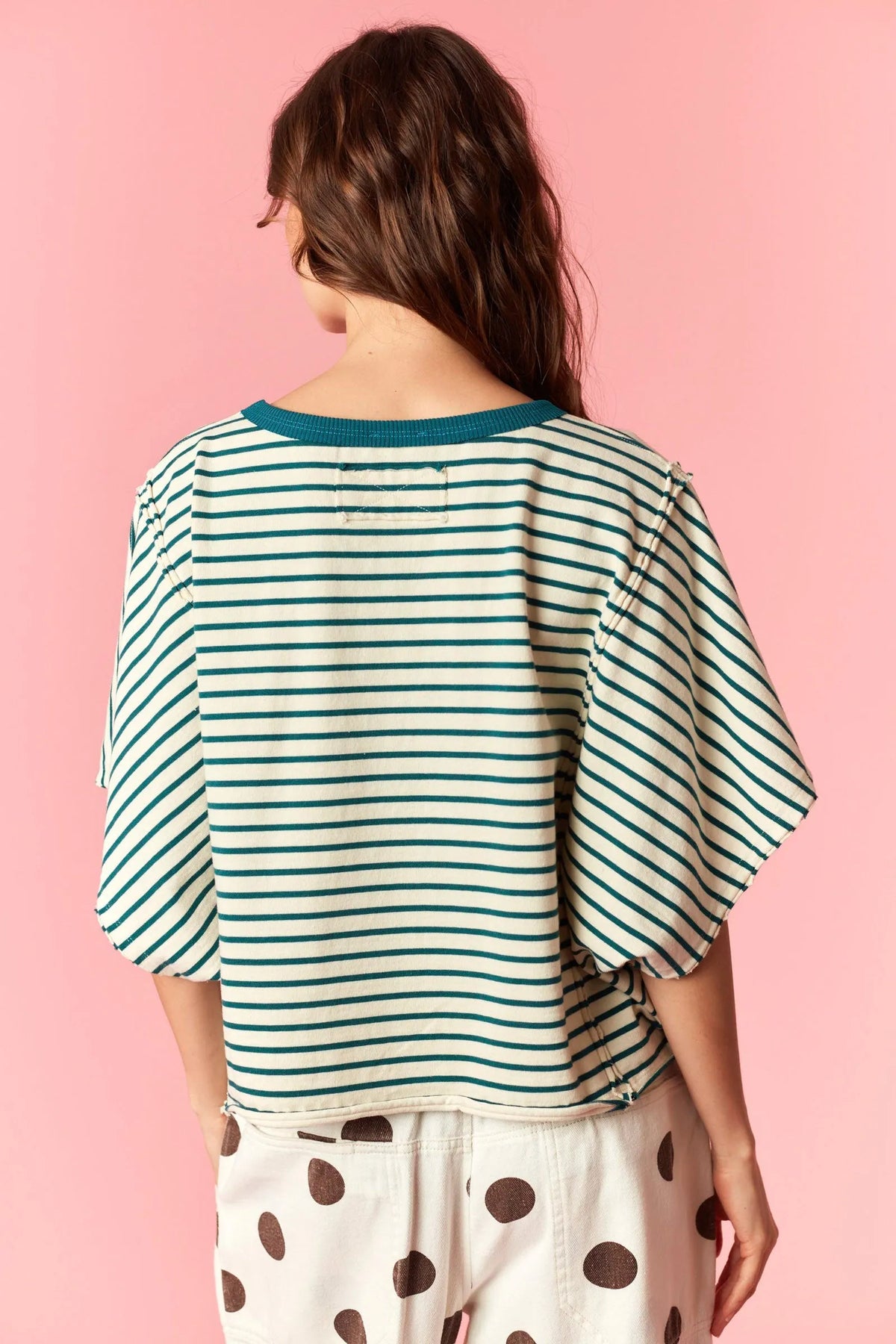 A teal and off-white yarn dyed stripe round neck tee with loose fit and ribbed crew neckline