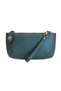 Mini crossbody wristlet clutch in teal pebbled leather with card slots gold-tone hardware and detachable black strap for women’s boho chic clothing shop daisy