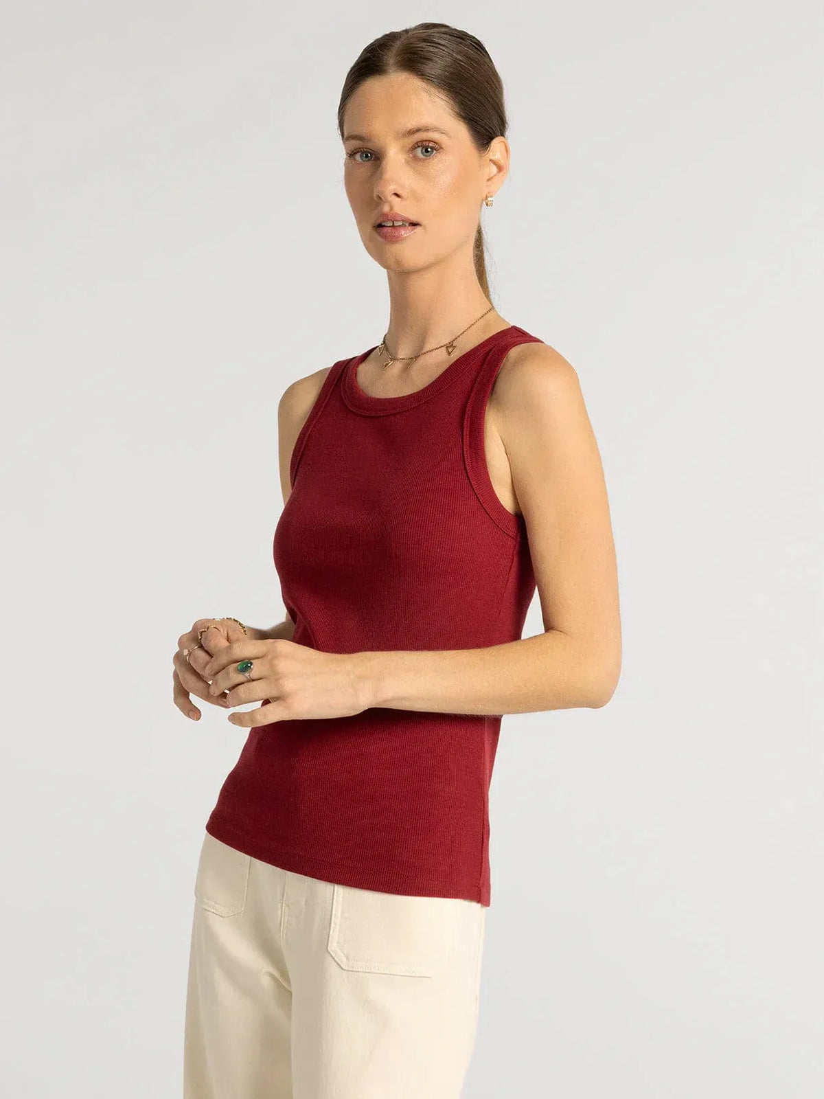 A fitted ribbed red sleeveless top with rounded neckline from thread and supply edlin basic tank collection