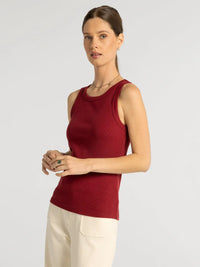 A fitted ribbed red sleeveless top with rounded neckline from thread and supply edlin basic tank collection