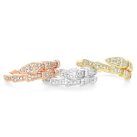 Three cubic zirconia patterned rings in rose, white, yellow gold