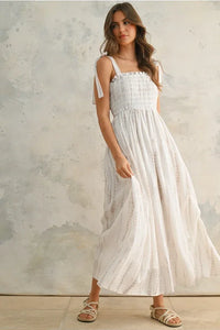 Boho chic women’s maxi dress with smocked bodice and tie-dye print