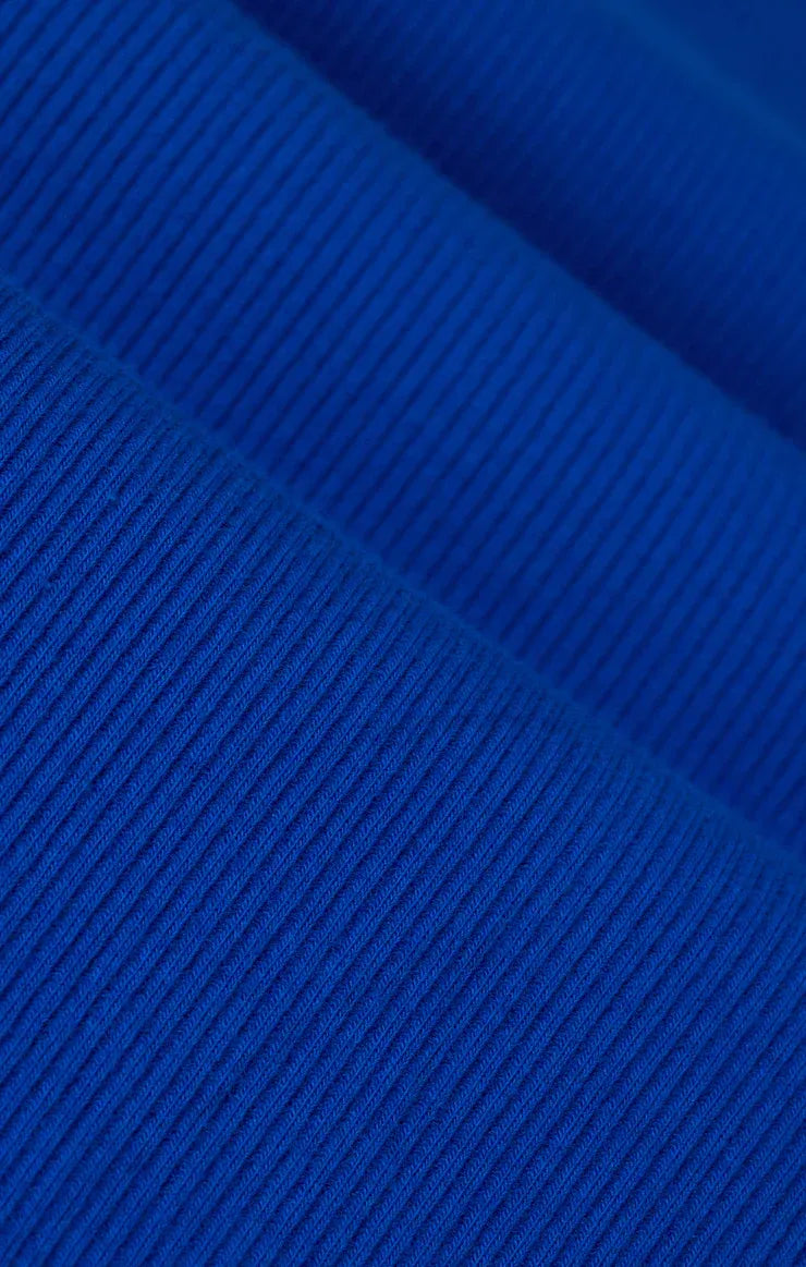 Vibrant royal blue clarke rib stitch tank top in ribbed knit fabric with a smooth textured surface