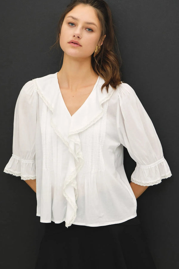 White vintage ruffled pintuck blouse with delicate lace trim neckline and soft ruffled front panel in lightweight fabric
