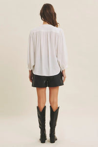 White blouse with puffed sleeves and gathered neckline in espresso hour linen blend relaxed balloon style