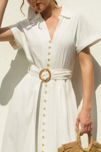 White button-down buckle maxi dress with wicker buckle and matching straw tote bag for elegant occasions