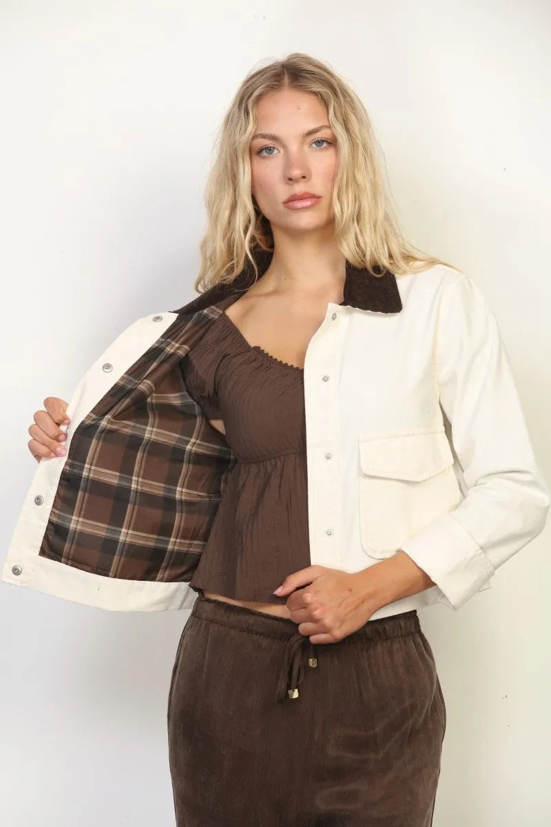 White button-up garment faded wash canvas barn jacket with dark brown plaid lining and contrasting black collar