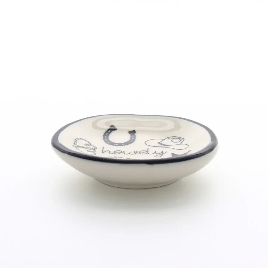White ceramic ring dish howdy western with black rim and hand-painted horseshoe cowboy hat design