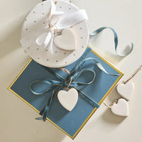 White ceramic enamel wood heart ornament with smooth matte finish and heart-shaped design for decorative use