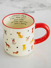 White ceramic bungalow mug with red handle and rim featuring colorful cartoon dogs and black hearts shop daisy