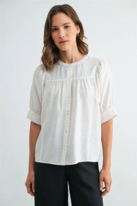 White cotton button down short sleeve blouse with puffed sleeves for a stylish and breathable sleeve blouse option