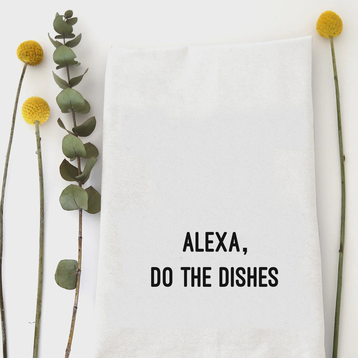 White cotton Alexa Do the Dishes tea towel with black text