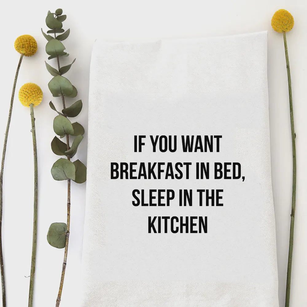 White cotton breakfast in bed tea towel with black text if you want breakfast in bed sleep in the kitchen