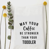 White cotton kitchen tea towel with May your coffee be stronger than your toddler print