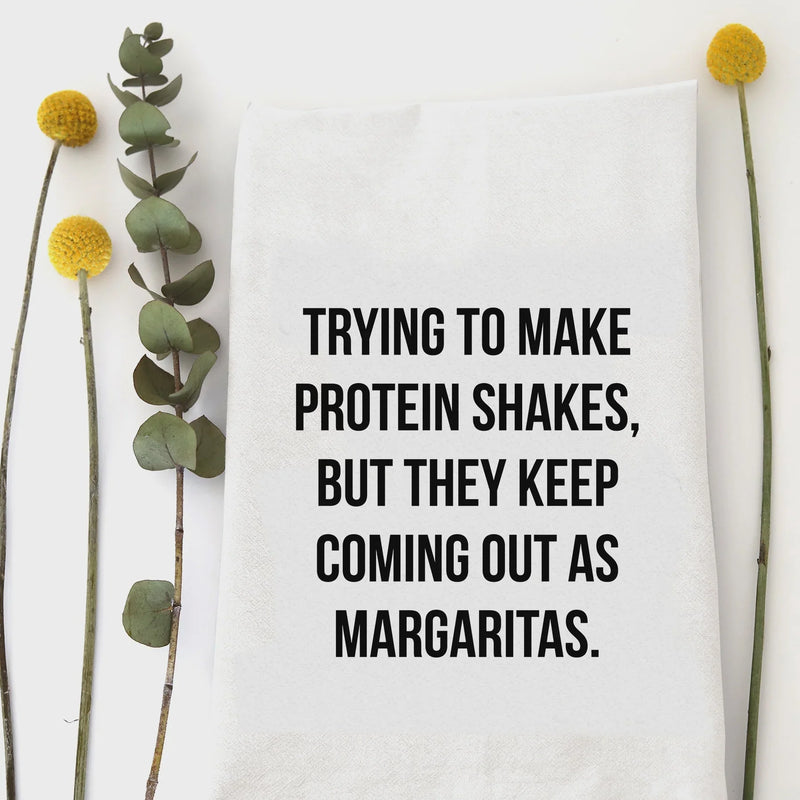 White cotton protein shakes kitchen tea towel with margarita joke text