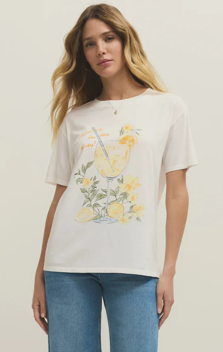 White cotton spritz boyfriend tee featuring a vibrant lemonade drink illustration with yellow lemons and flowers