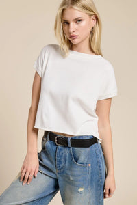 White lightweight knit short sleeve tee with a relaxed fit and cropped length made from breathable fabric