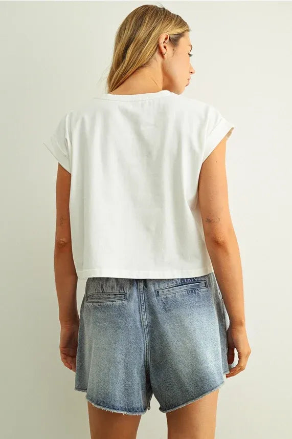 White cropped sleeveless t-shirt with relaxed fit and rounded neckline featuring usa floral patchwork design
