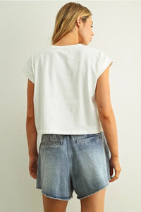 White cropped sleeveless t-shirt with relaxed fit and rounded neckline featuring usa floral patchwork design