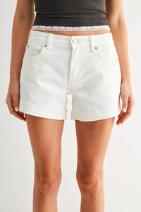White denim low rise slit lightweight short with classic five-pocket design and silver toned hardware