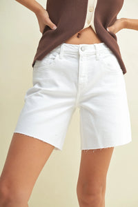 White denim mid rise bermuda denim jean shorts with frayed hem ideal for casual summer wear