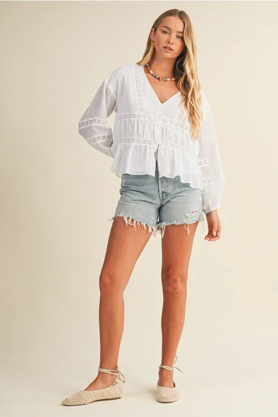 White V Ruffle Neck Blouse with embroidered long sleeves and flared hem