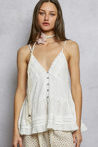 White embroidered v neck sleeveless relaxed fit top with delicate lace trim and button details