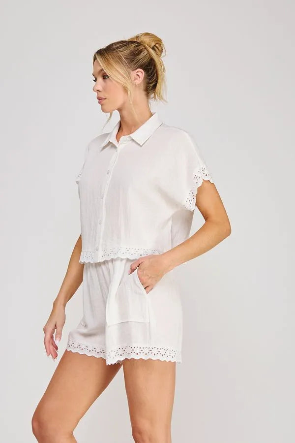 White linen blend short sleeve dolman button front top with scalloped lace trim and embroidery