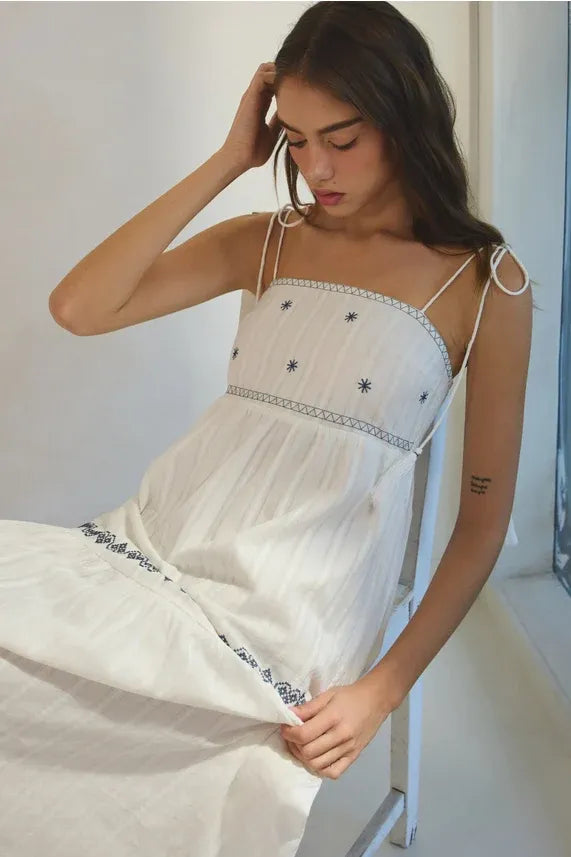 White embroidered tassel maxi dress with star pattern and thin straps
