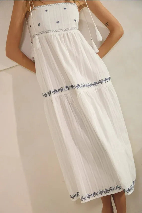 White embroidered tassel maxi dress with black star trim