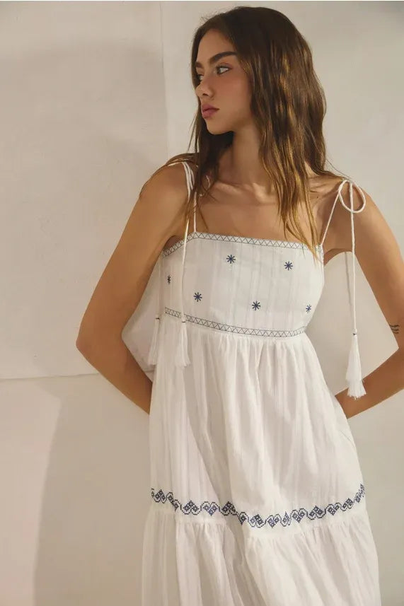White embroidered tassel maxi dress with blue star details