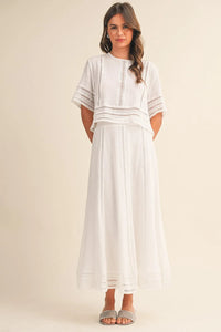 White embroidered lace trim cotton maxi skirt with delicate lace detailing on sleeves and skirt front view