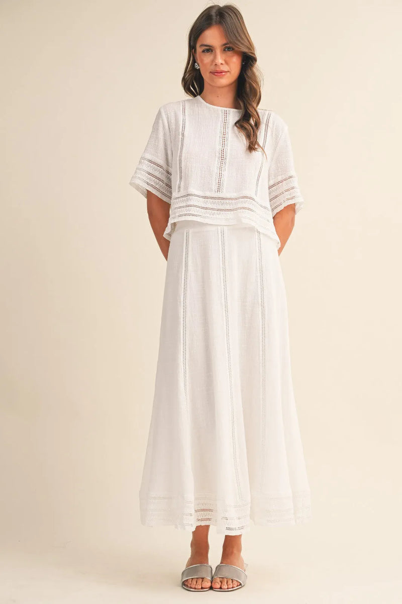 White embroidered lace trim cotton maxi skirt with delicate lace detailing on sleeves and skirt front view